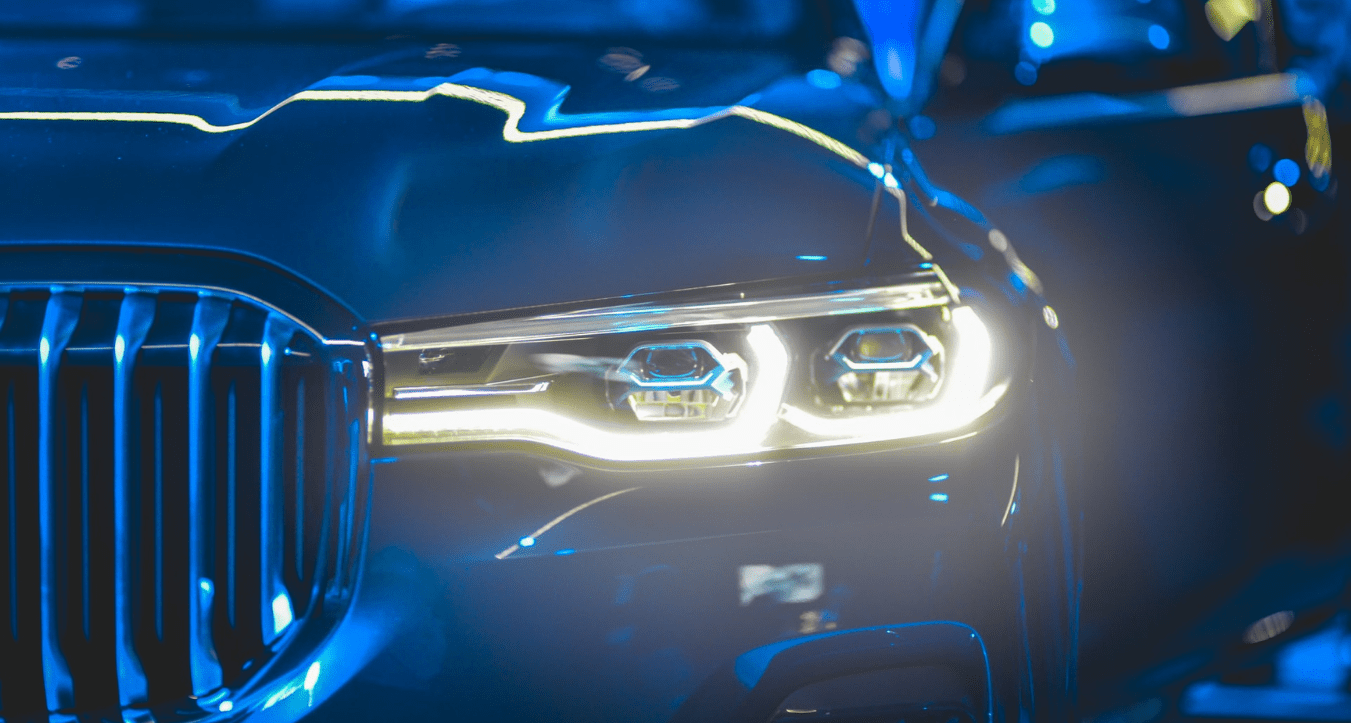 Headlights of a blue car
