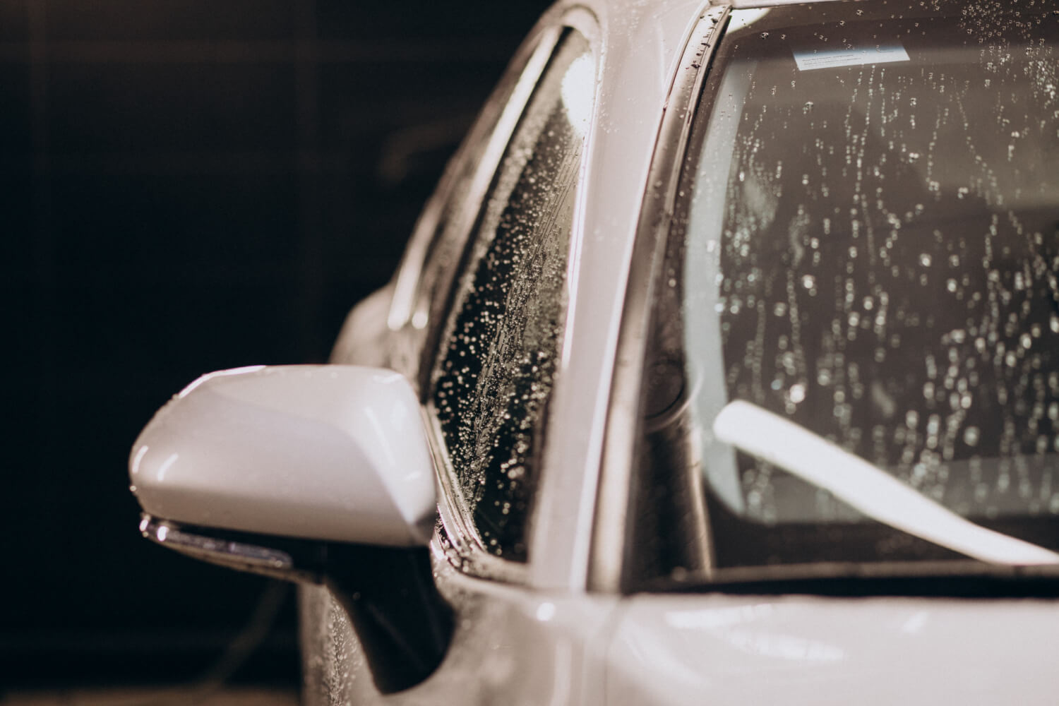 a hail-damaged vehicle in a dealership