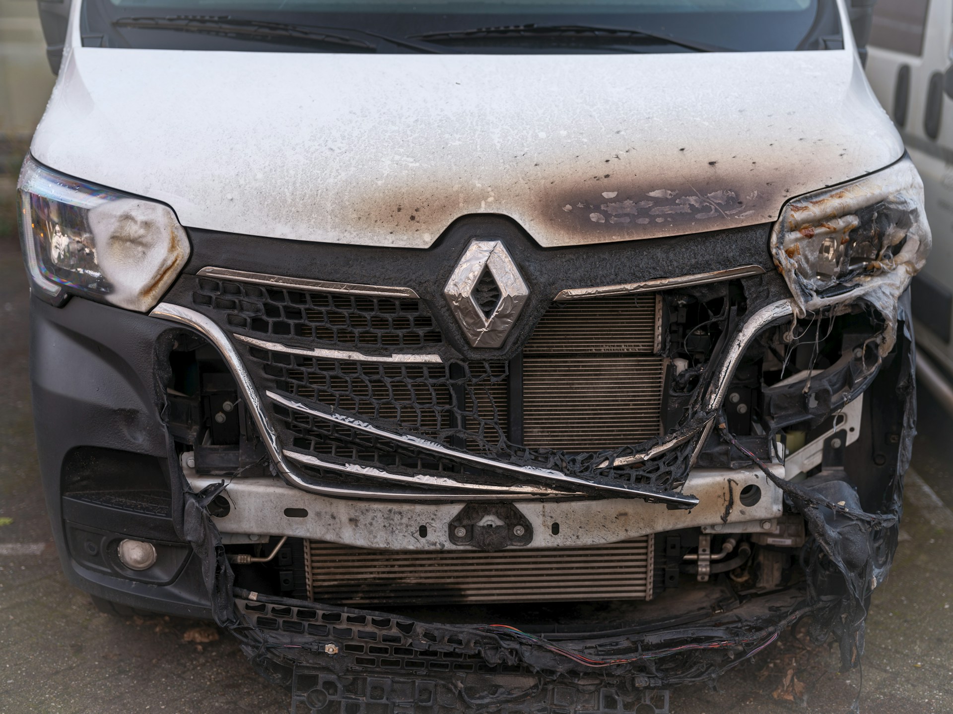 damaged and burnt minivan