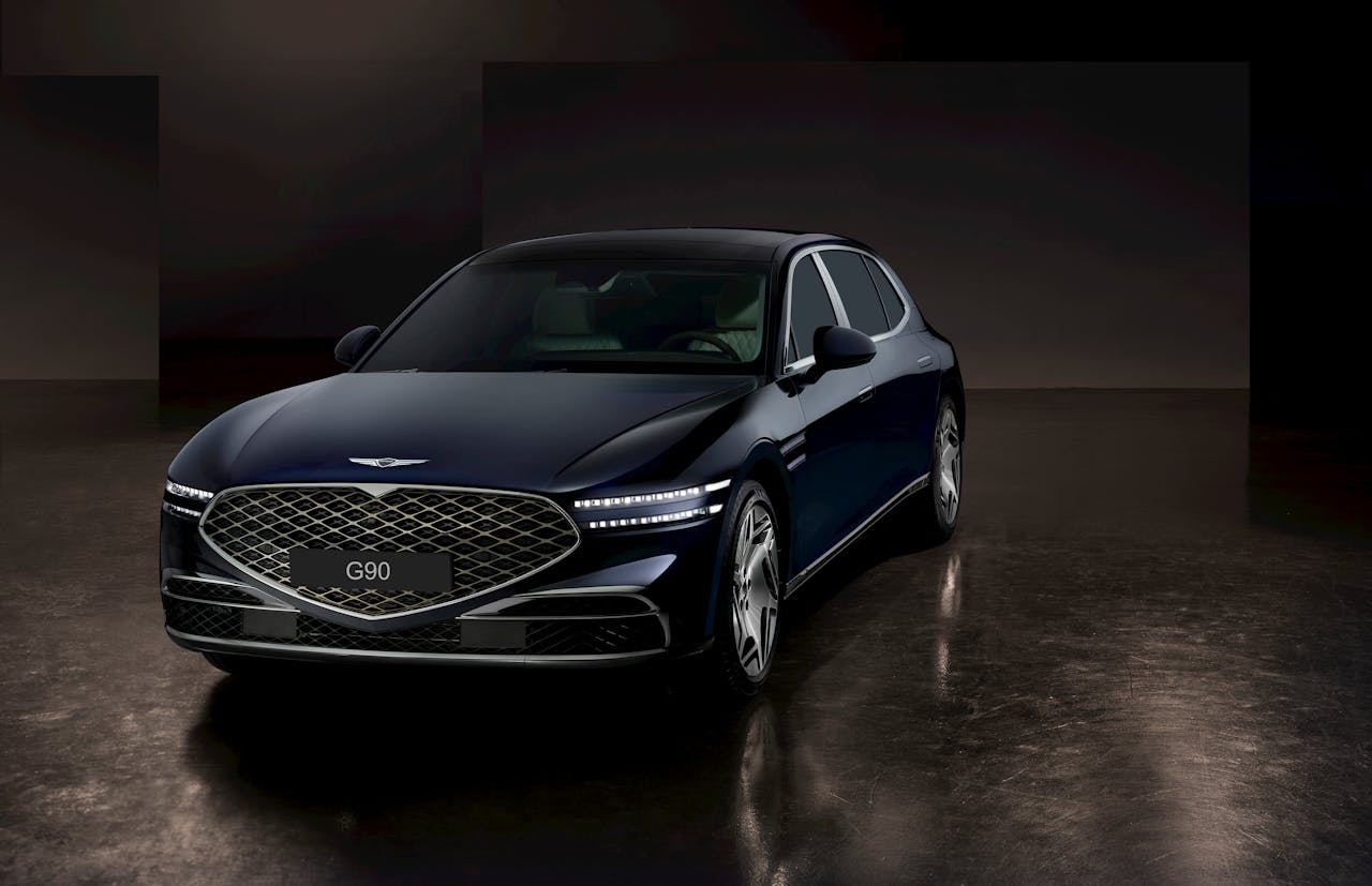 Genesis G90 in an empty parking lot