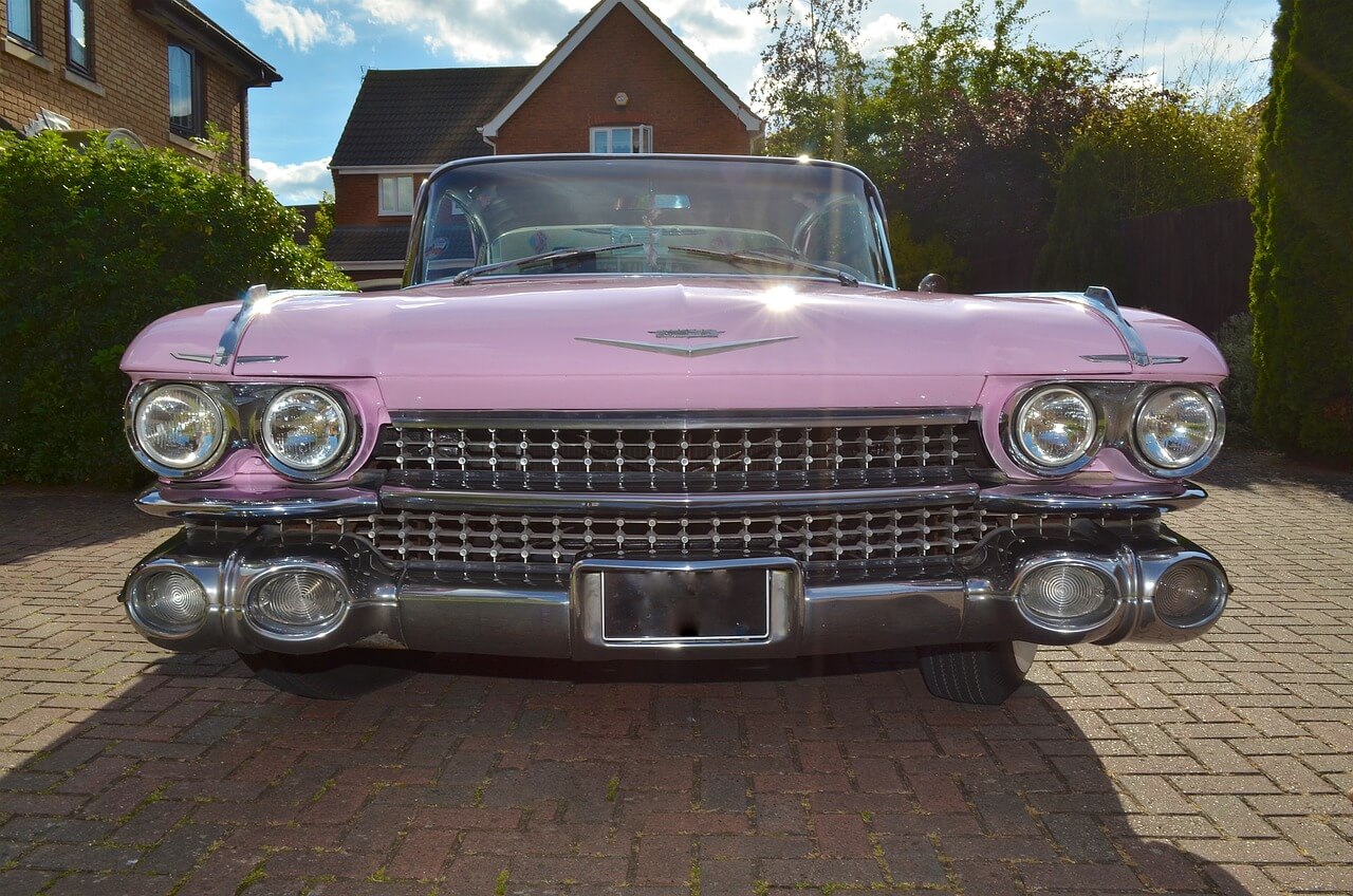 a pink Cadillac vehicle