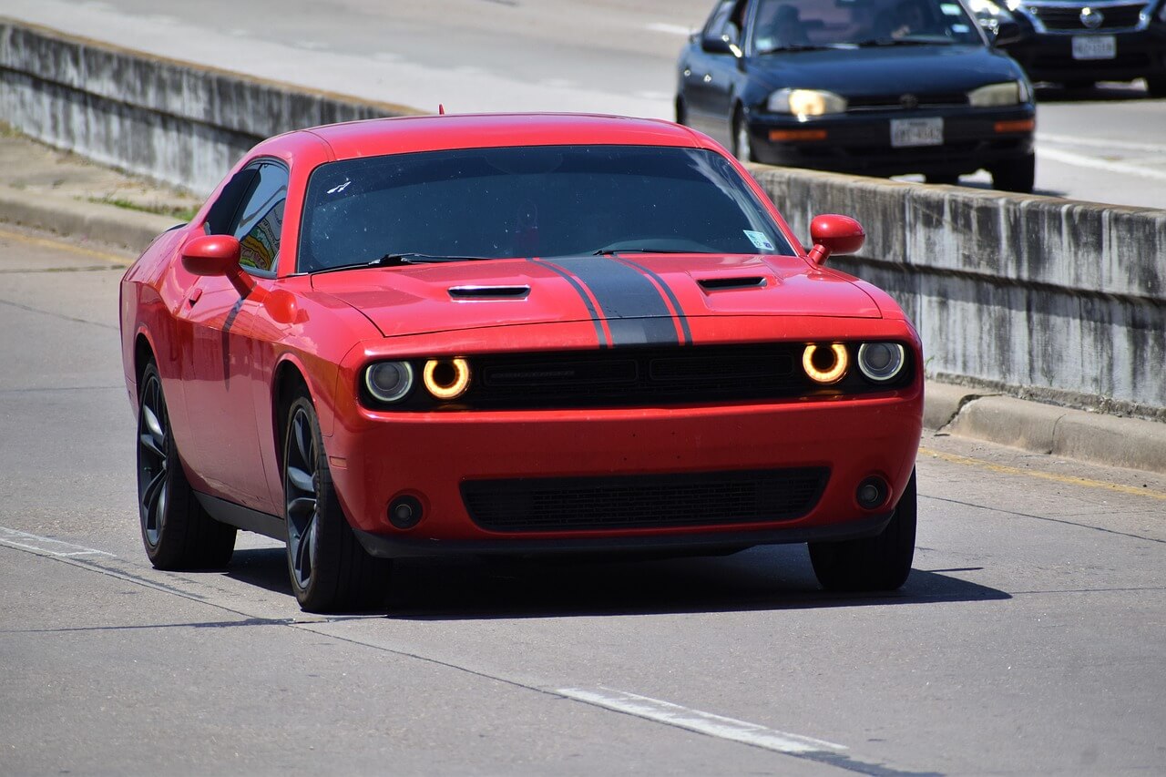 a Dodge car cruising on the road
