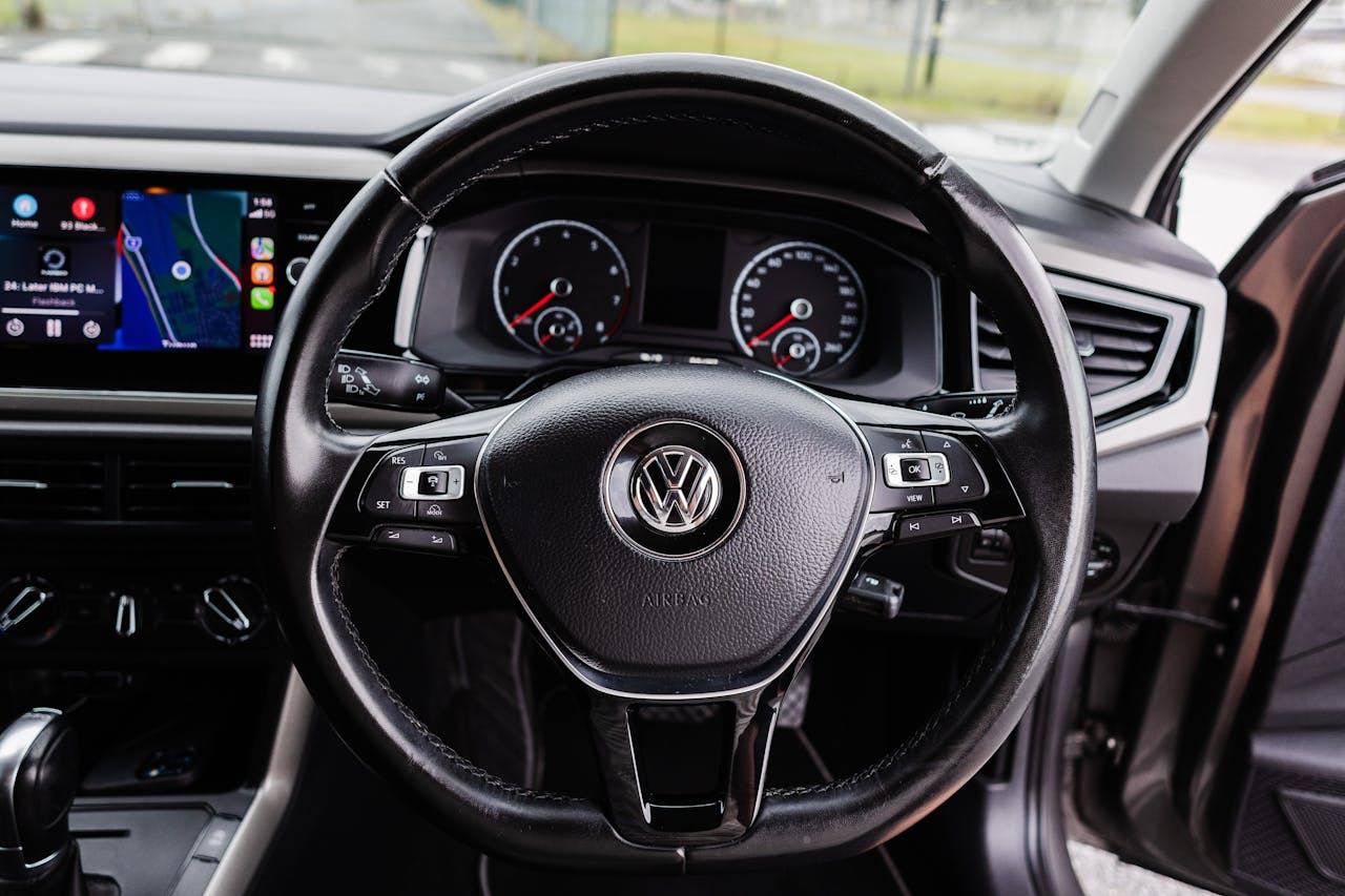 A steering wheel in a Volkswagen car
