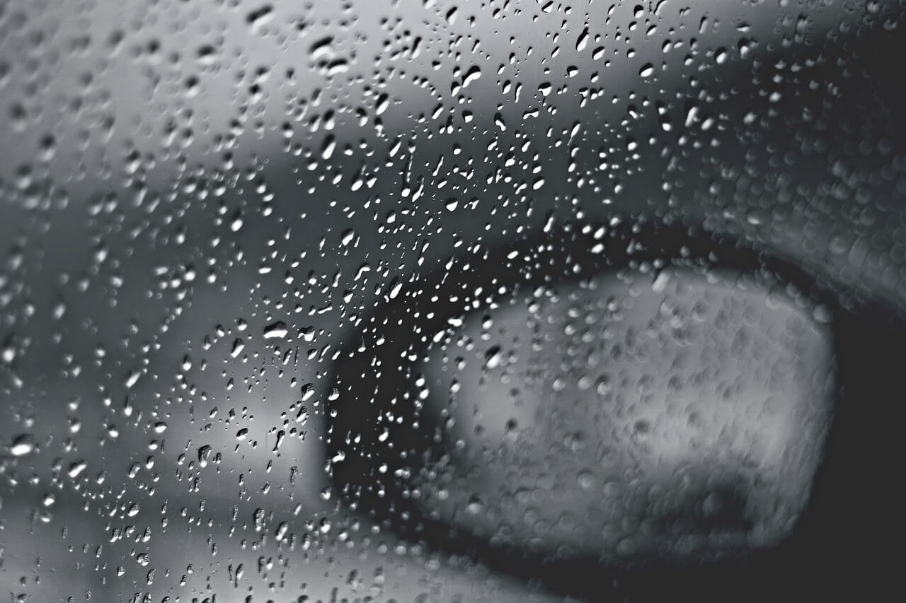 a car window with raindrops