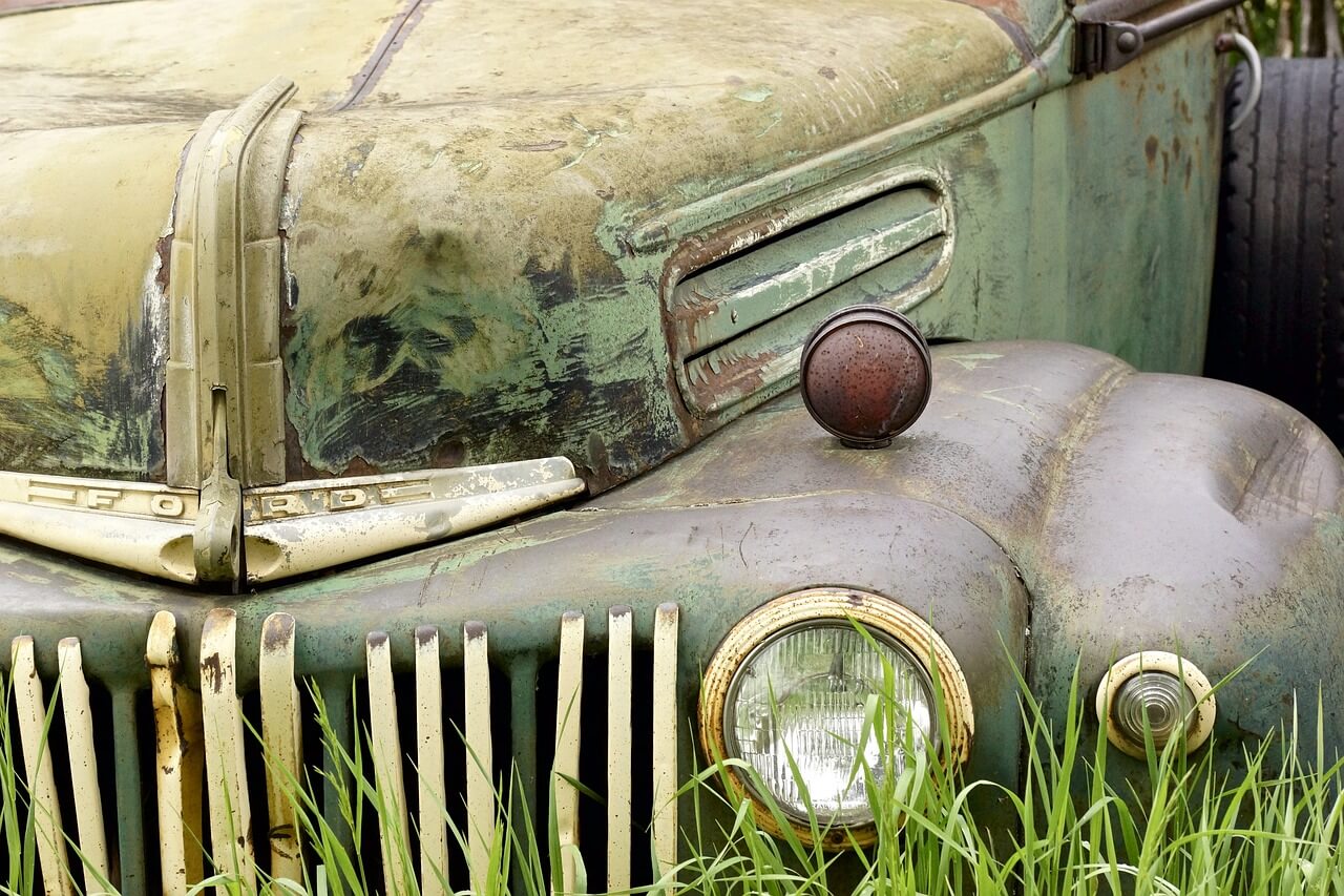 an antique rusted vehicle