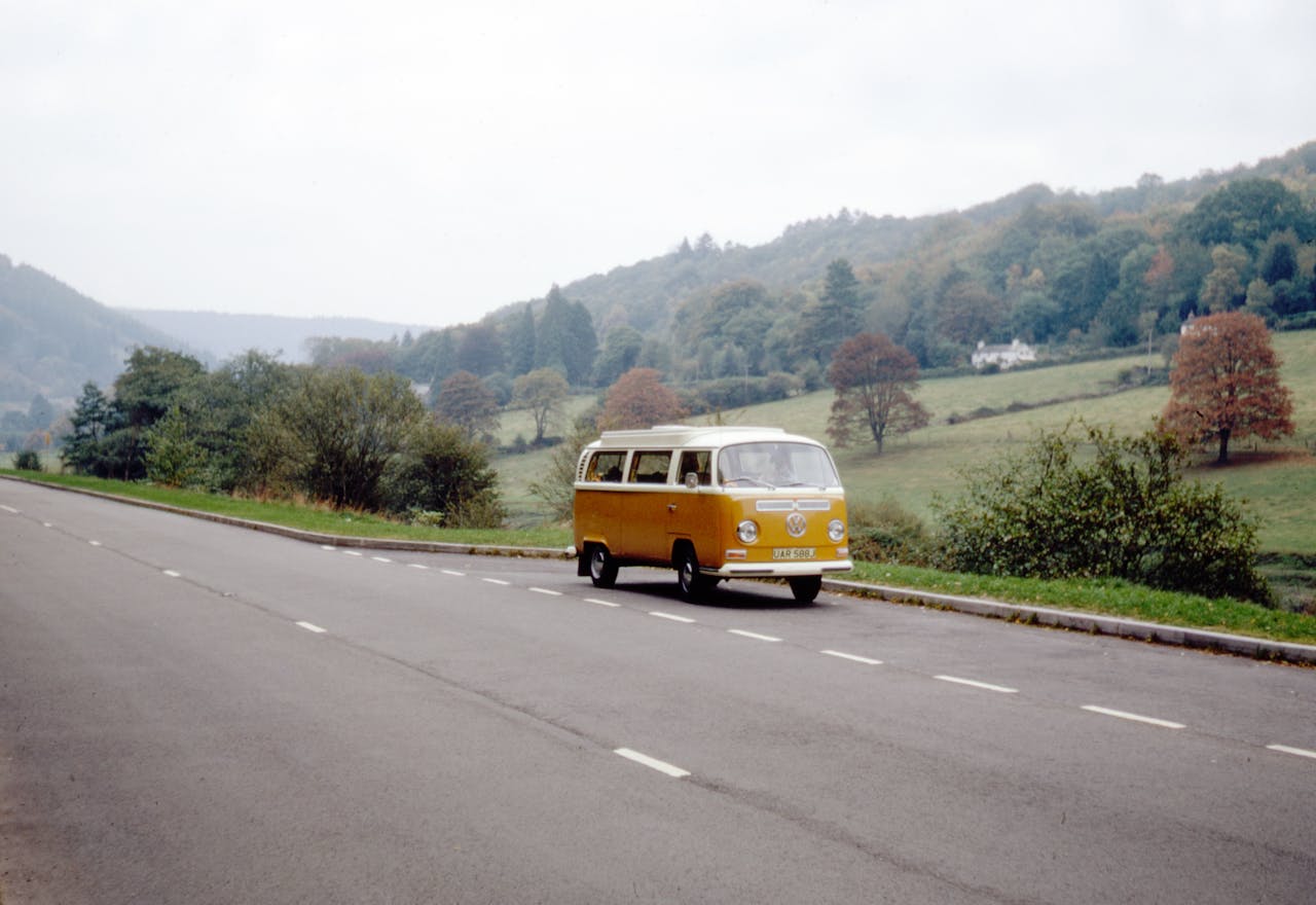 An old Volkswagen bus on the road
